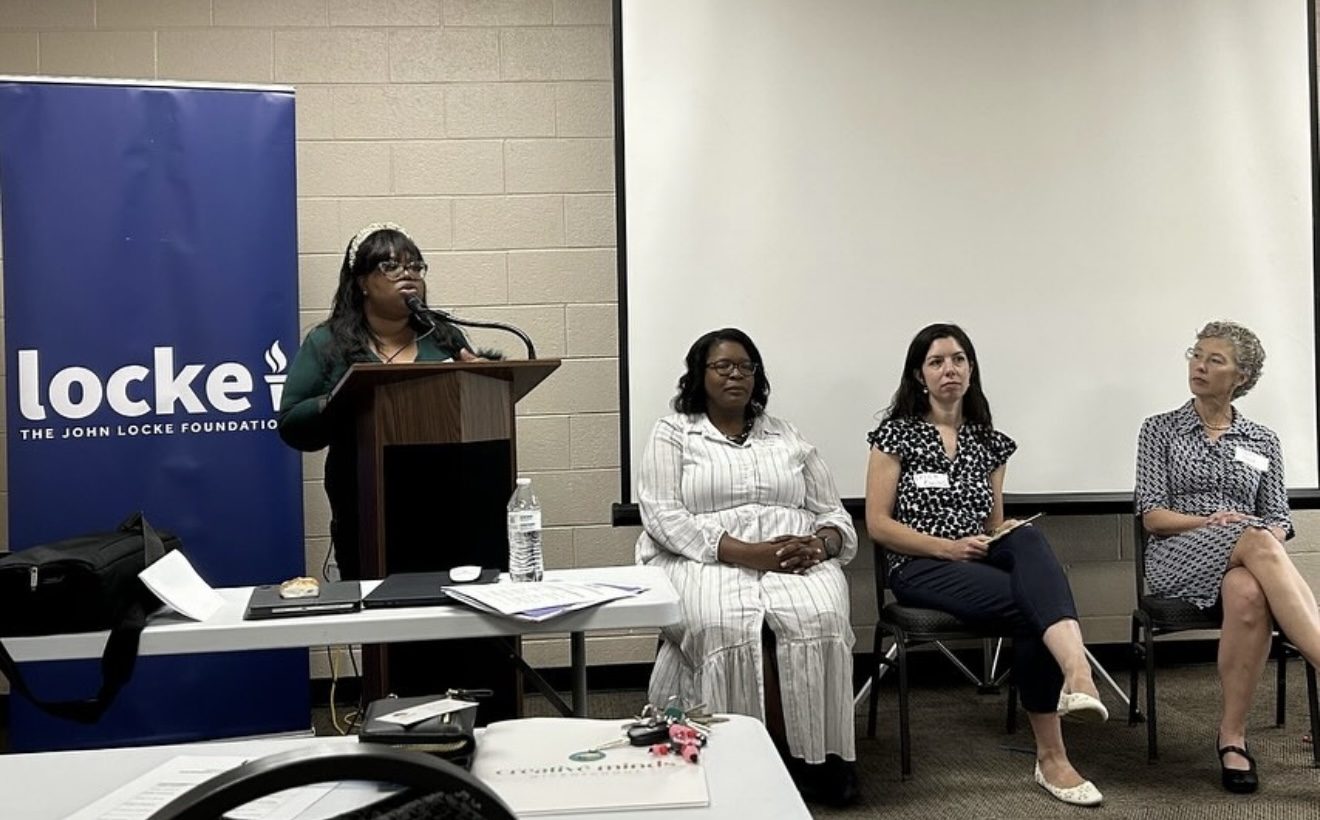 Dominque Burgess speaking on a panel at the John Locke Foundation